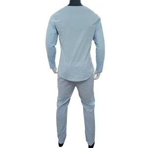 Back view showing the fit and texture of light blue linen long-sleeve t-shirt set