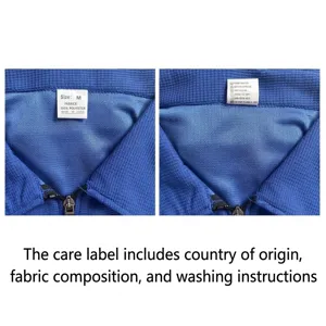 Detailed view of labels on a blue waffle knit jacket showing size and washing instructions