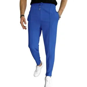 Close-up detail of blue waffle knit fabric on men's drawstring casual trousers