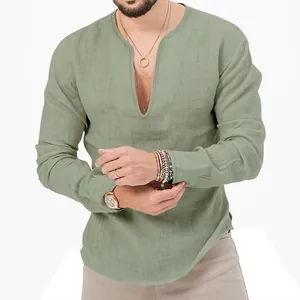 Detail shot of sage green long-sleeved linen t-shirt with a deep v-neck design
