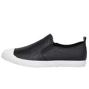 Professional black leather men's slip-on loafers featuring a stylish white rubber toe cap