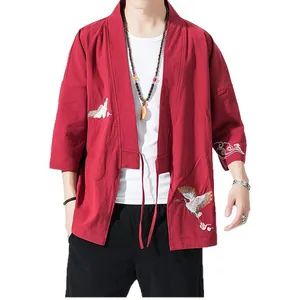 Traditional red kimono cardigan featuring white crane embroidery and loose fit design