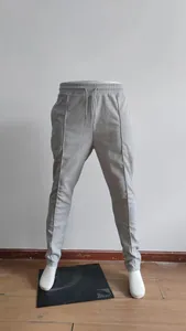 Full view of men's gray waffle knit casual joggers with an elastic drawstring waist