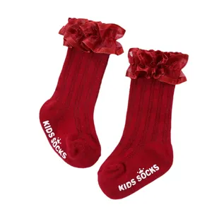 Vibrant red ruffled lace kids socks featuring anti-slip sole dots for baby girls ages 0-1