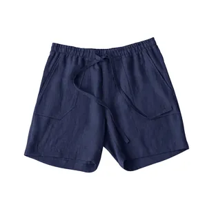 Close-up of navy blue linen shorts featuring drawstring and elastic waistband