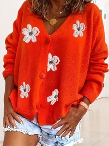 Cardigan in maglia arancione vintage per donna con eleganti ricami di fiori bianchi