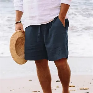 Dettaglio dei pantaloncini da mare uomo in cotone lino blu navy con comoda coulisse.