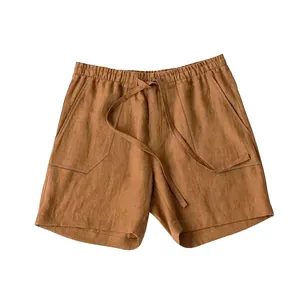 Detailed view of men's summer linen drawstring shorts in breathable brown fabric