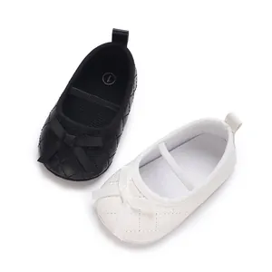Classic quilted baby girl flats with cute bow detail in black and white color options