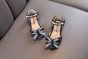 Zapatos de princesa negros para niña con lazo de diamantes y correas de perlas