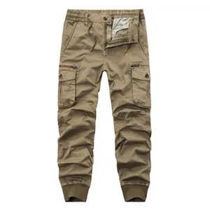 Close-up detail of men's khaki cargo jogger pants featuring drawstring and pockets
