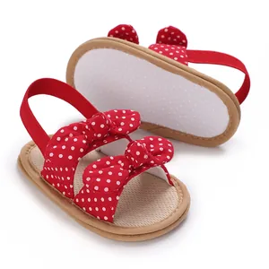 Sandalias rojas de lunares para bebé con suela blanda y lazo decorativo