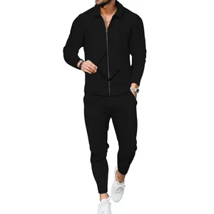 Men's black waffle knit tracksuit set with slim-fit zip-up jacket and long pants