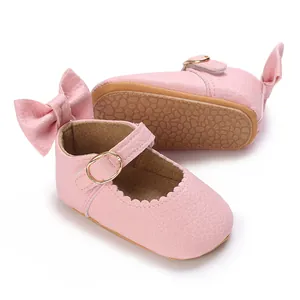 Soft pink PU leather infant Mary Jane shoes with decorative bow and non-slip sole