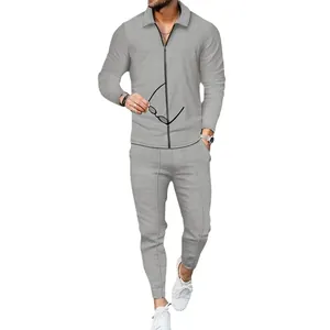 Stylish men's grey waffle knit two-piece tracksuit featuring zip-up cardigan and joggers