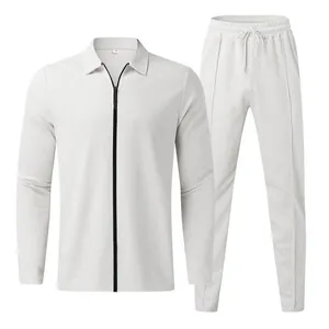 Detailed look at men's white waffle knit tracksuit set with zip polo shirt and pants