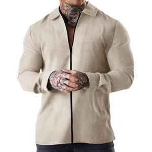 Close-up detail of men's khaki waffle knit zip-up cardigan showing texture and collar