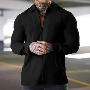 Detailed view of men's casual black waffle knit zip-up jacket with textured fabric
