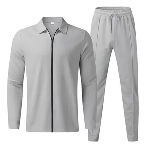 Grey waffle-knit tracksuit set with zip-up polo long sleeve and drawstring pants.