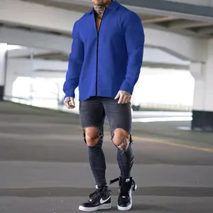 Close-up detail of a blue waffle knit zip-up jacket with lapel for men casual wear