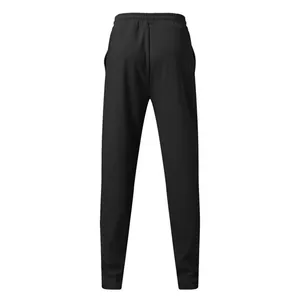 Vista posterior de pantalones de chándal de punto gofrado negro para hombre con cintura elástica.