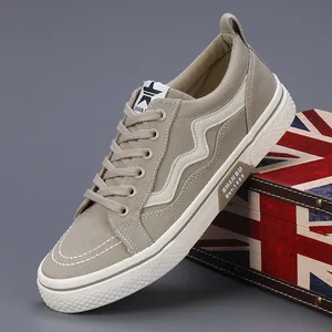 Stylish men's khaki lace-up canvas sneakers with wavy side stripes and flat soles