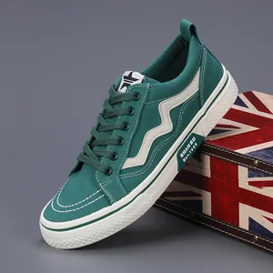 Stylish green men's casual canvas sneakers featuring a comfortable flat lace-up design