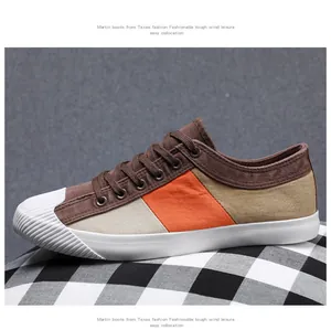 Mehrfarbiger Herren-Canvas-Sneaker mit orangefarbenem Streifendetail und weißer Gummikappe