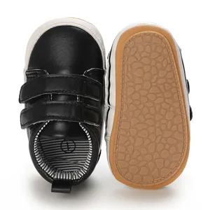 Baby boy walking shoes featuring velcro straps and anti-slip patterned rubber soles