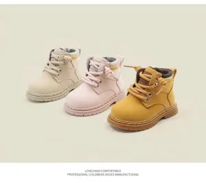Detail view of toddler British style Martin boots in beige, pink, and yellow colors.