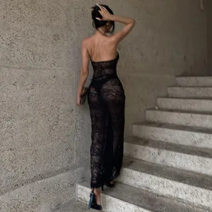 Detail view of a sexy black lace see-through tube bodycon maxi dress for women.