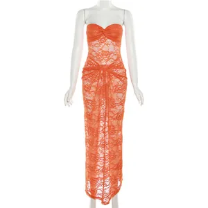 Detail shot of sexy orange lace strapless perspective bodycon maxi dress for women