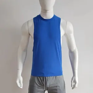 Detailed view of blue muscle tank top with large side armholes on mannequin.