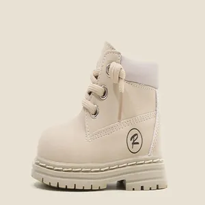 Detailed side view of toddler cream Martin boots with anti-slip thick sole for autumn