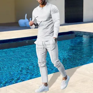 Men's white two-piece casual tracksuit featuring a long-sleeved Henley t-shirt and pants