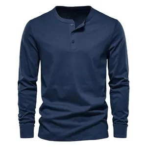 Classic navy blue long-sleeved Henley shirt with buttoned placket for modern men.