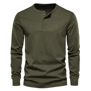 Detailed view of olive green long-sleeve Henley shirt featuring a classic three-button placket