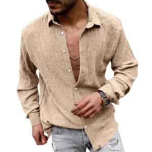 Detailed view of men's casual long-sleeve shirt in textured seersucker fabric