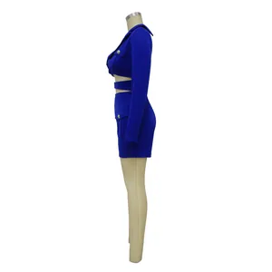 Side view detail of a cobalt blue long-sleeve cutout romper with decorative buttons