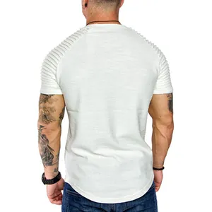 Detailed back view of men's white slim fit t-shirt featuring pleated raglan shoulder texture