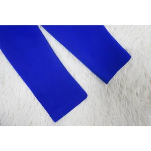 Detailed view of the high-quality stitching on the cuffs of a royal blue jumpsuit