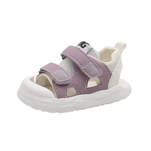 Detailed side view of purple and white breathable baby sandals with Velcro straps