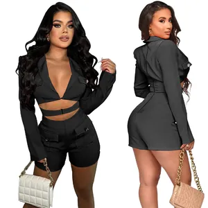Front and back view of a sexy black deep V-neck long sleeve romper with utility pockets.