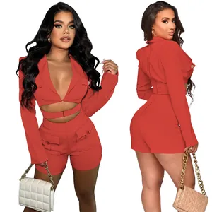 Front and back detail of a vibrant red two-piece crop blazer and shorts set