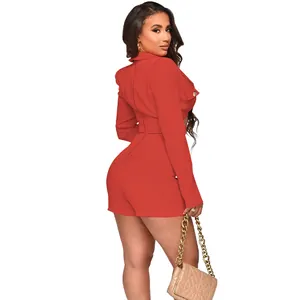Back view of a sexy red long-sleeve romper featuring a sleek tailored fit and pockets