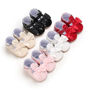 Weiche Lauflernschuhe für Baby-Mädchen mit Zierschleife und rutschfester Gummisohle.