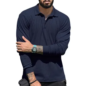 Detail showing the vertical ribbed texture of a navy blue men's casual long sleeve polo shirt