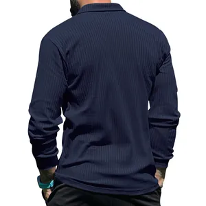 Detailed back view of a men's navy blue ribbed long sleeve polo shirt with classic collar.