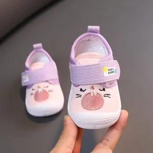 Cute pink squeaky walking shoes for toddlers with cartoon embroidery and Velcro strap