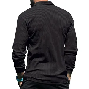Detailed rear view of a black long-sleeved ribbed polo shirt showing fabric texture